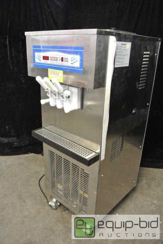 lot 1499 image: Commercial Two Flavor Soft Serve Ice Cream Machine on Casters