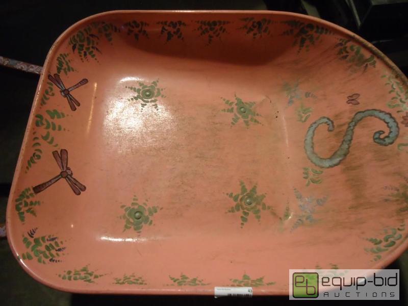 lot 43 image: Pink Wheel Barrel