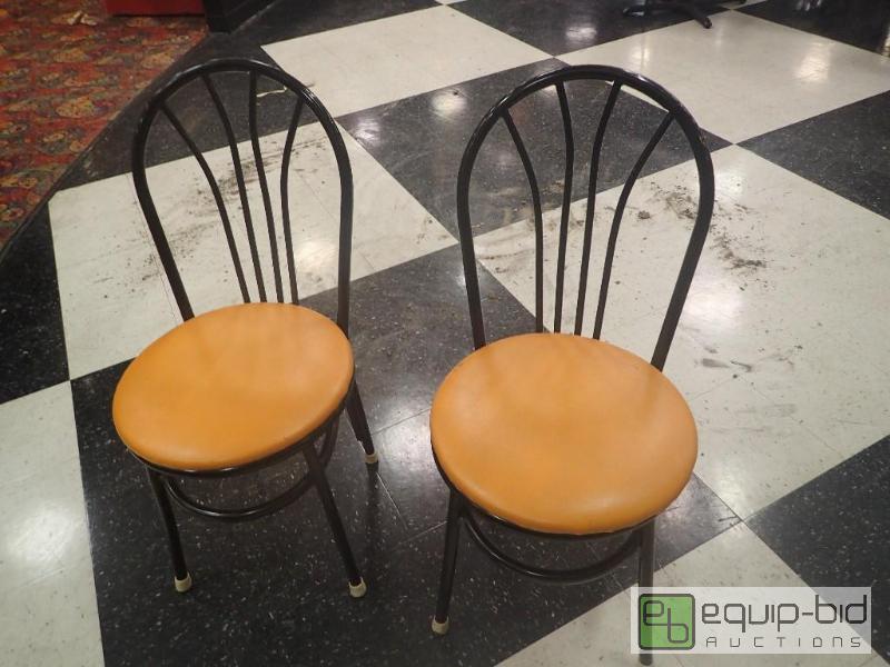 lot 1165 image: (2) Yellow Padded Metal Framed Chairs