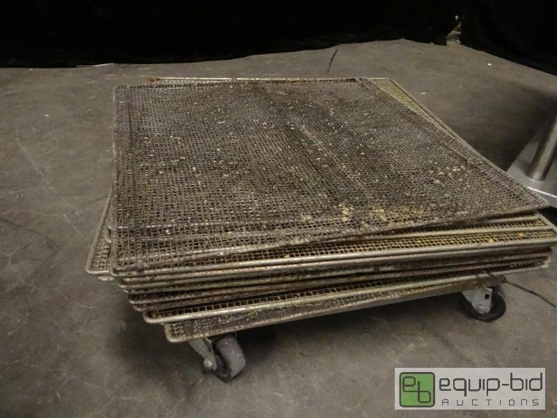 lot 7292 image: Stack of Doughnut Fryer Screens