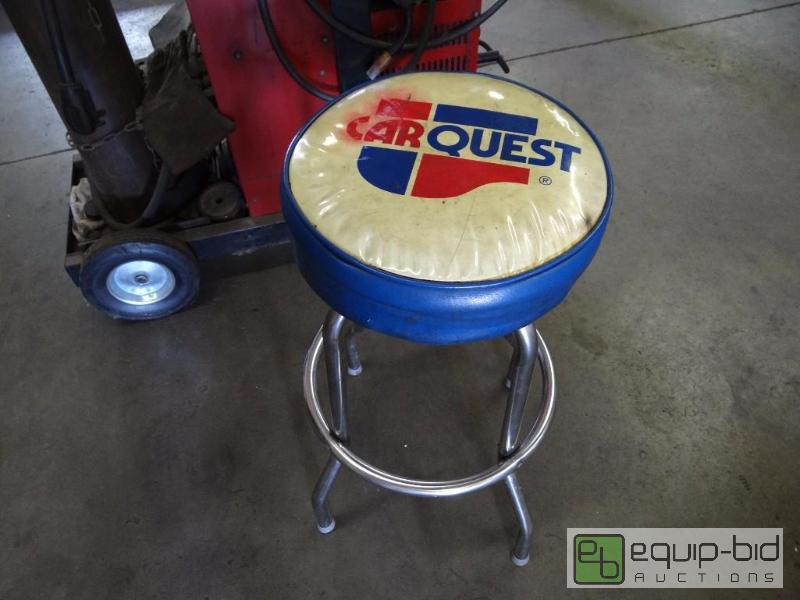 lot 552 image: CarQuest auto shop stool...
