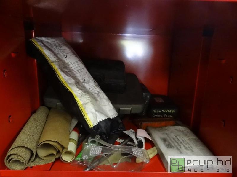 lot 647 image: Contents of shelf .. Car jack, spark plug rem...