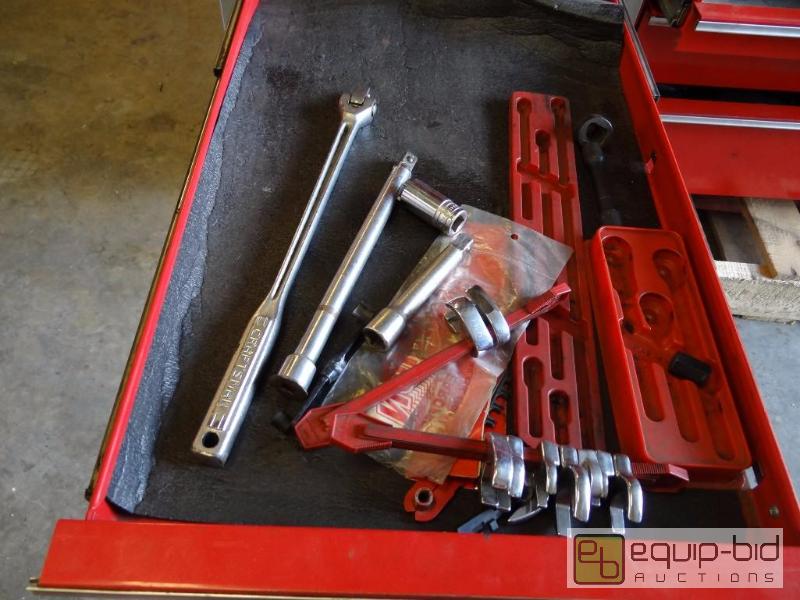 lot 663 image: Contents of shelf  Craftsman breaker bar, ext...