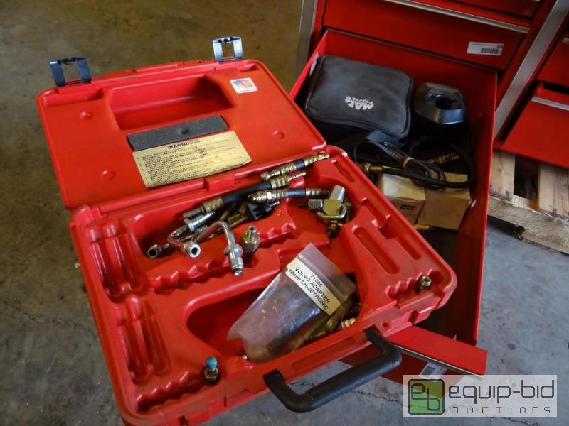 lot 665 image: Contents of shelf  Stetoscope and fuel inject...