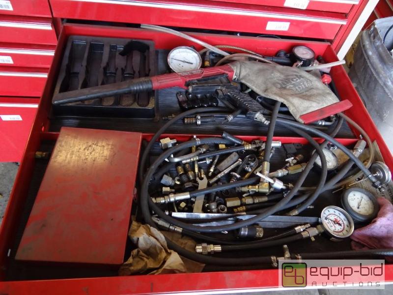 lot 680 image: Contents of shelf  Matco air powered vacuum, ...