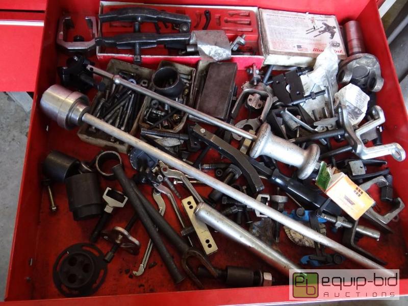 lot 682 image: Contents of shelf  Pullers and misc parts...