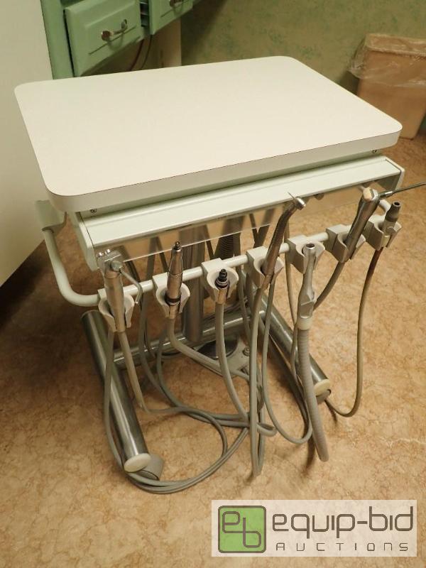 lot 573 image: portable dental cart with vacume attatchment