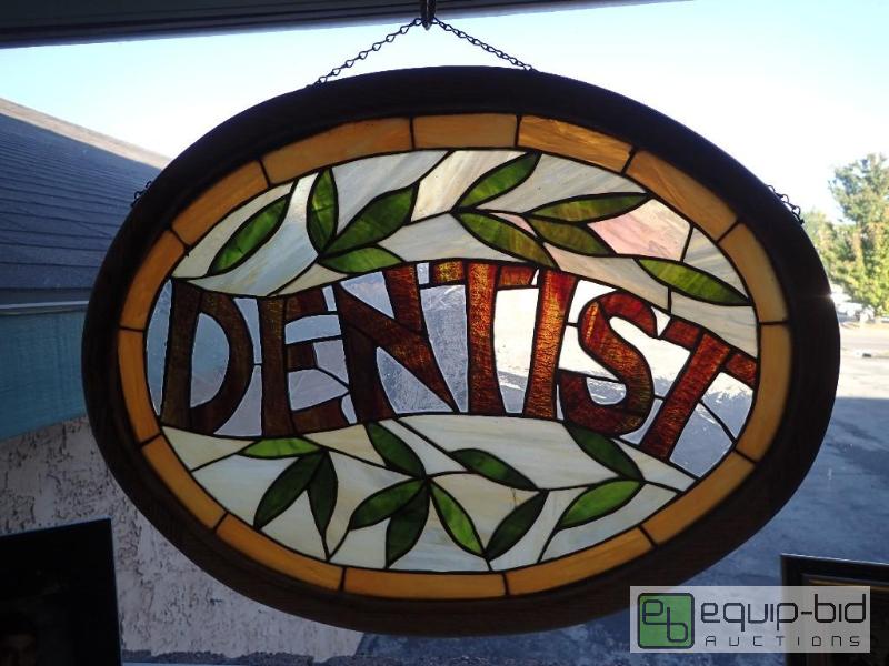 lot 603 image: Oval Custom Made Stained Dentist Decore