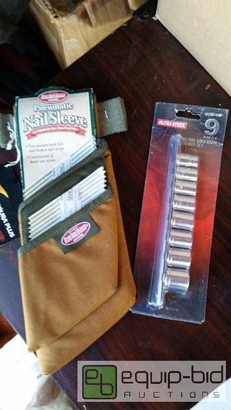 lot 105 image: NAIL HOLDER FOR TOOL BELT AND SOCKET SET NEW