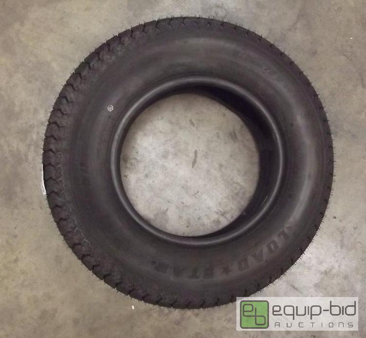 lot 2315 image: NEWLoad Start Tire   See pictures for d...