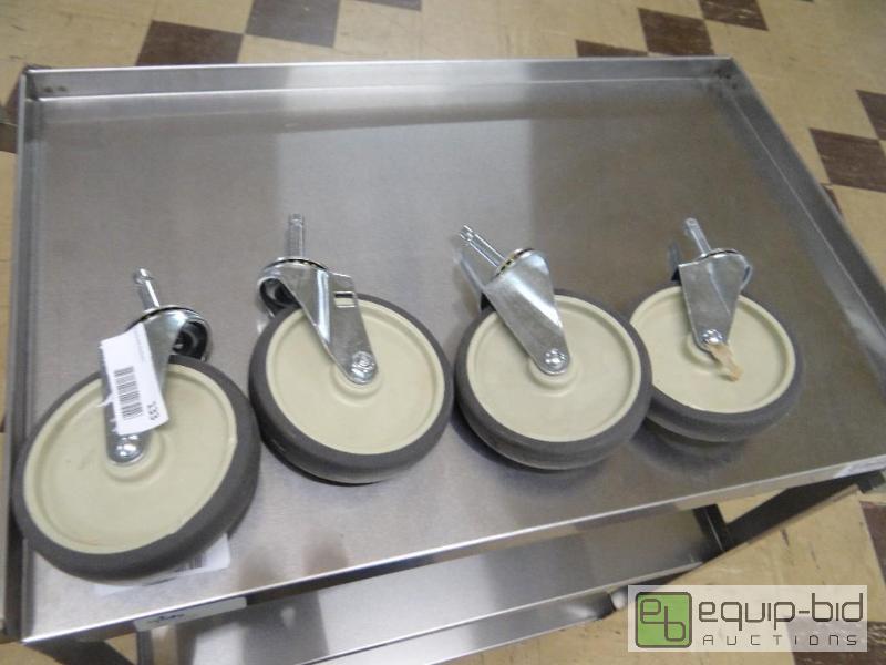 lot 133 image: Lot of 4 new equipment wheels....