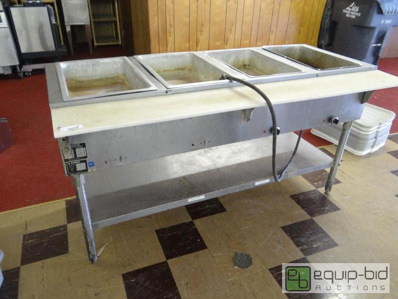 lot 180 image: Eagle 4 hole ss steam table with cutting boa...