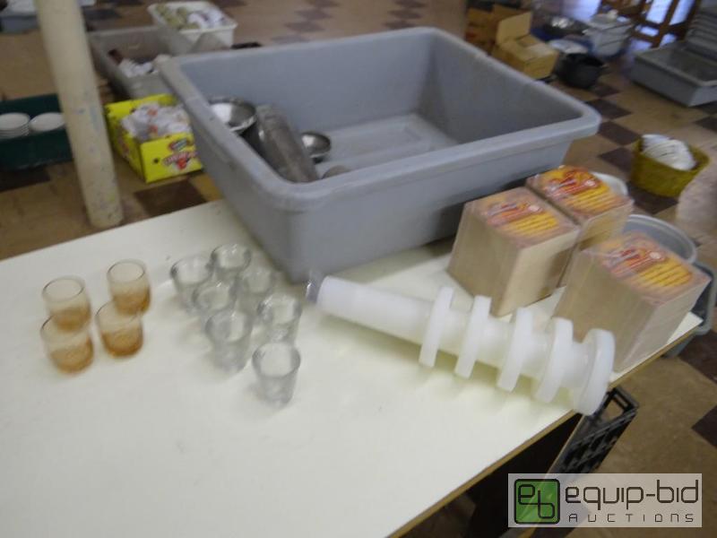 lot 189 image: Bus tub with bar supplies.  3 packages of Bud...