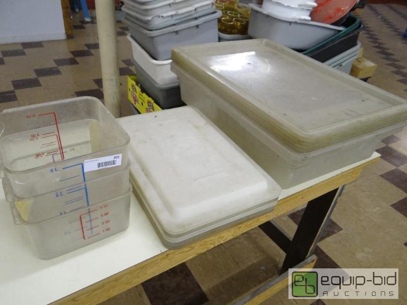 lot 202 image: Lot of plastic containers and various lids....