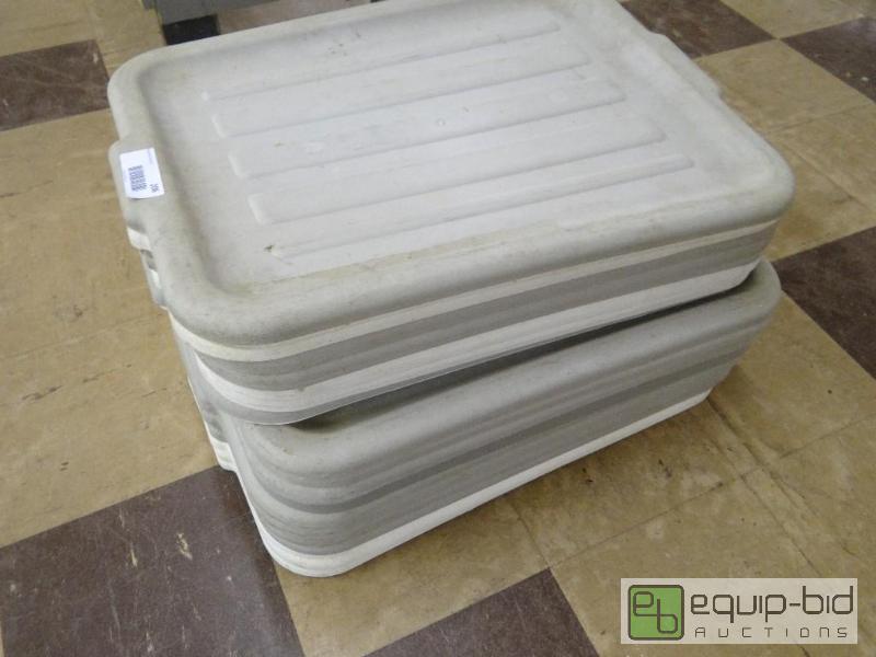 lot 206 image: Bus tub full of coffee cups and stack of bus ...