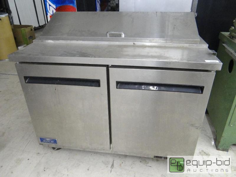 lot 236 image: Arctic air prep table with 2 doors.  Top door...