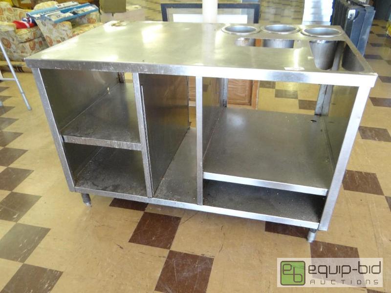 lot 384 image: Stainless steel table with storage....