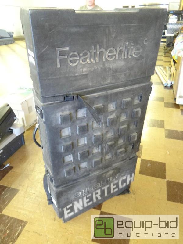 lot 392 image: Feather light plastic travel case on wheels....