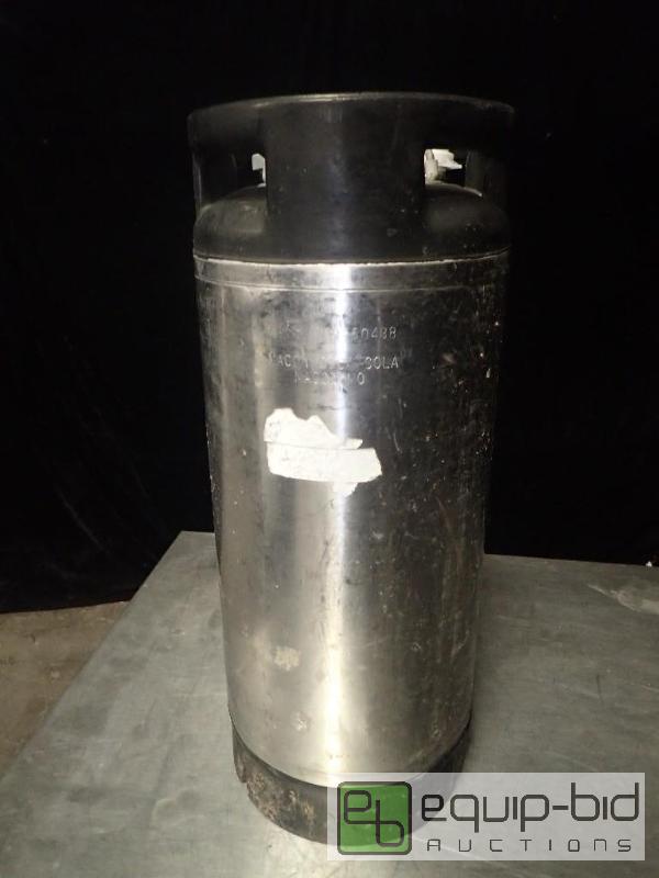 lot 1055 image: Old style syrup container