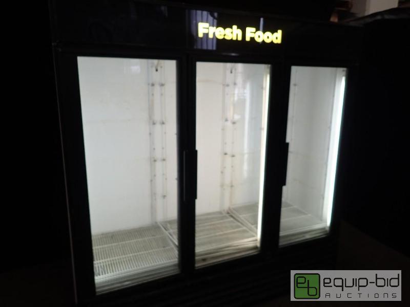 lot 1069 image: True Three Door Merchandising Cooler