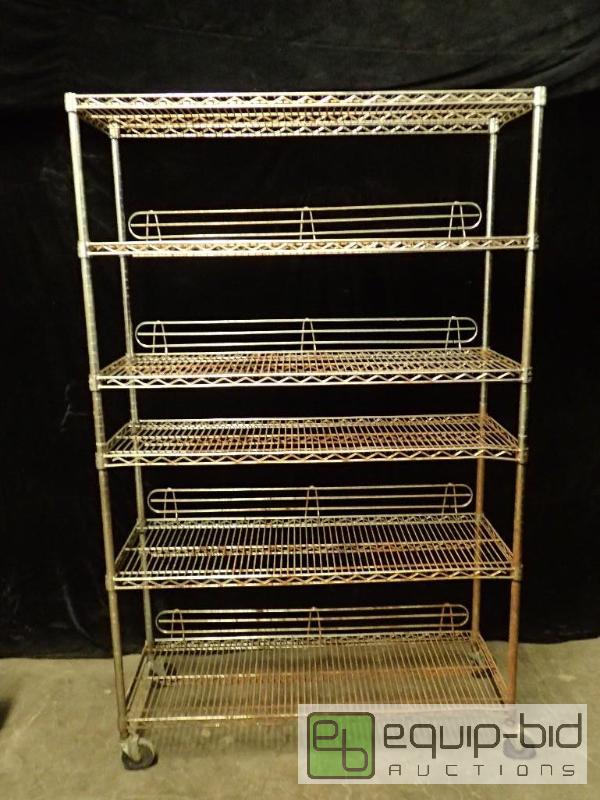 lot 1088 image: 6 Tier Wire Rack On Casters