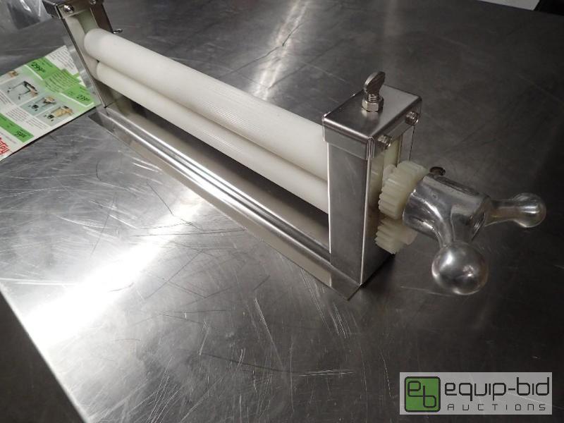 lot 1090 image: Oatey Bag Roller