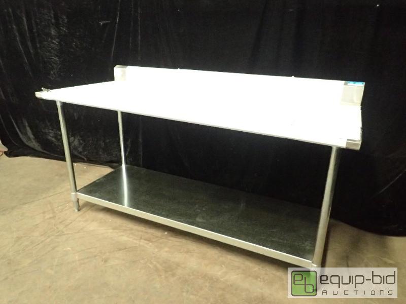 lot 7014 image: B and K Stainless Table with Under Shelf with 6in Backsplash