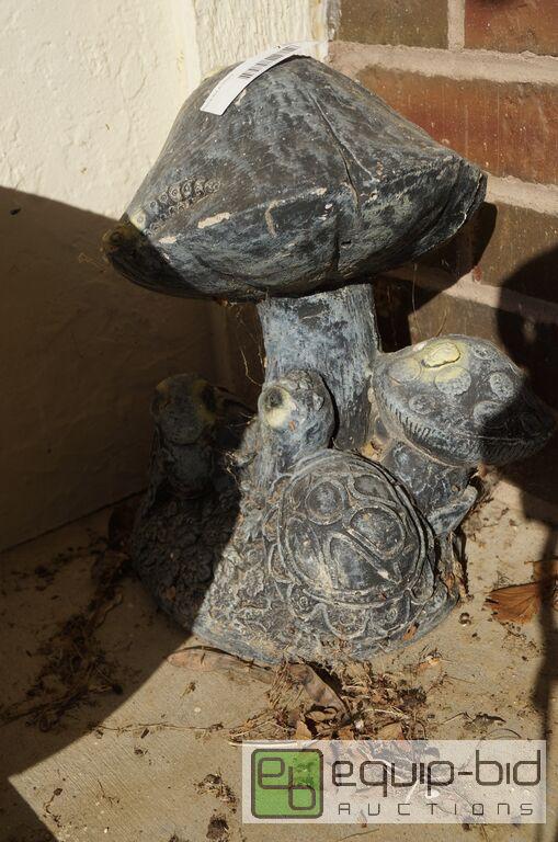lot 731 image: Mushroom yard art
