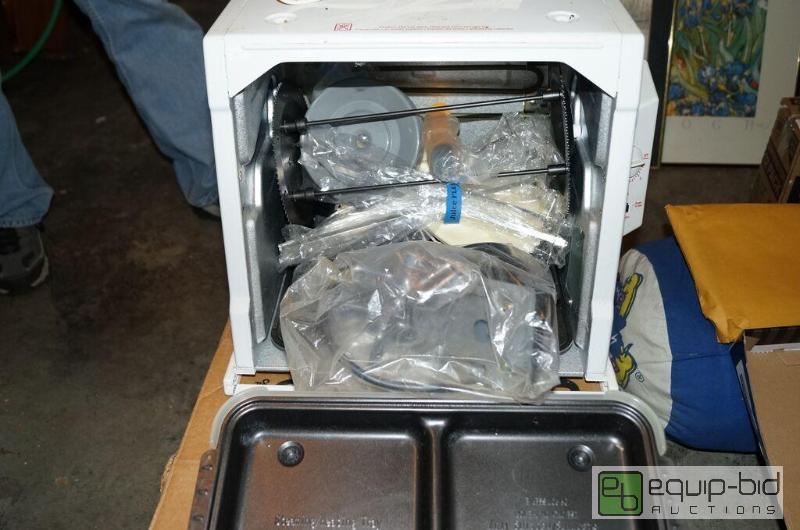 lot 8060 image: Looks New Rotisserie  Contents