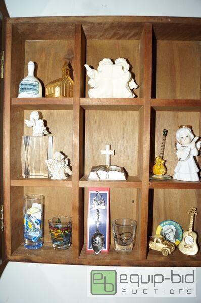 lot 8198A image: Contents of Cabinet - Several Brass Mini ELGIN clocks, Vintage Hopalong Cassidy Pin, Bells, Spoons