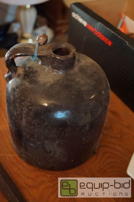 lot 826 image: Early Antique Brown Crockery Moonshine Jug