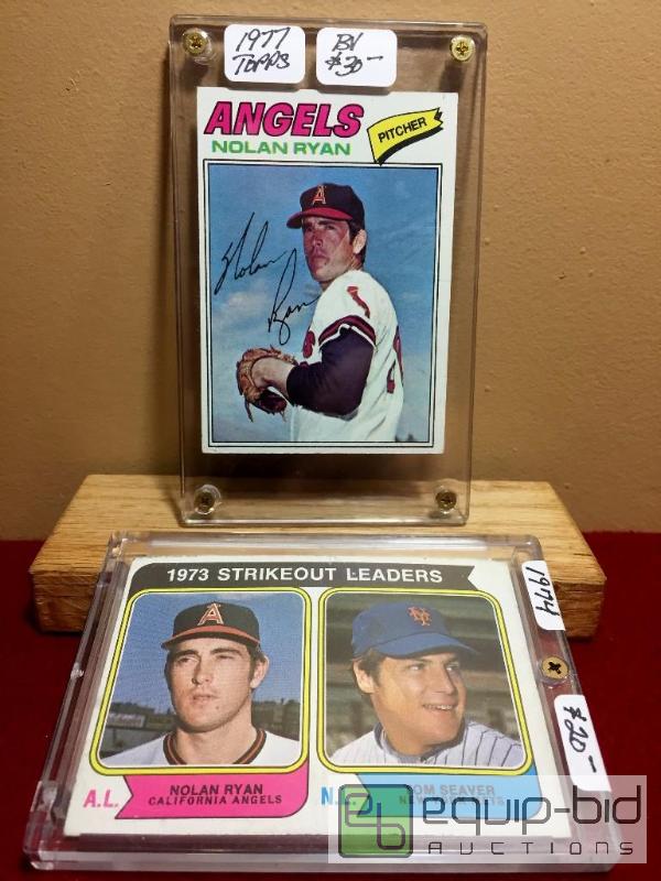 lot 1034 image: NOLAN RYAN LOT (2) CARDS 1977 -BOOK VALUE $30  1974 - BOOK VALUE $20 -- TOTAL LOT VALUE $70