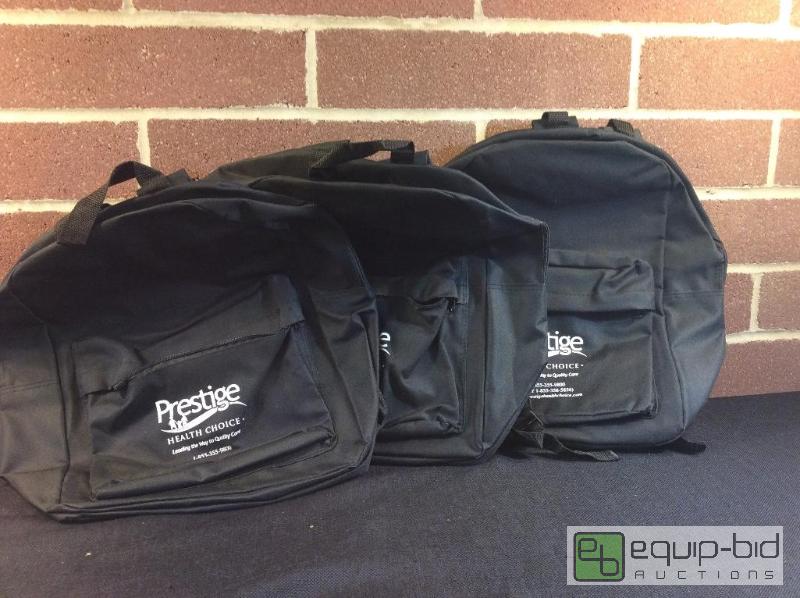 lot 1082 image: Black Canvas Backpacks With Printed Logo  Qua...