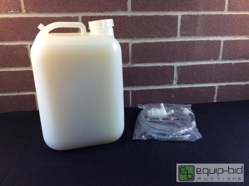 lot 1083 image: Wax Refill Kit 5-Gallon With Hose For Treadmi...