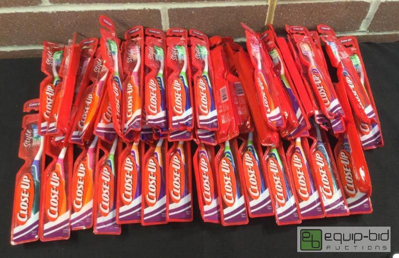 lot 1101 image: Close up Style Soft Toothbrushes  Quantity 4...