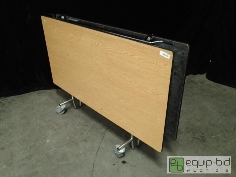 lot 9479 image: 60 x 60 Wood Folding Tableff with Metal Legs on Casters