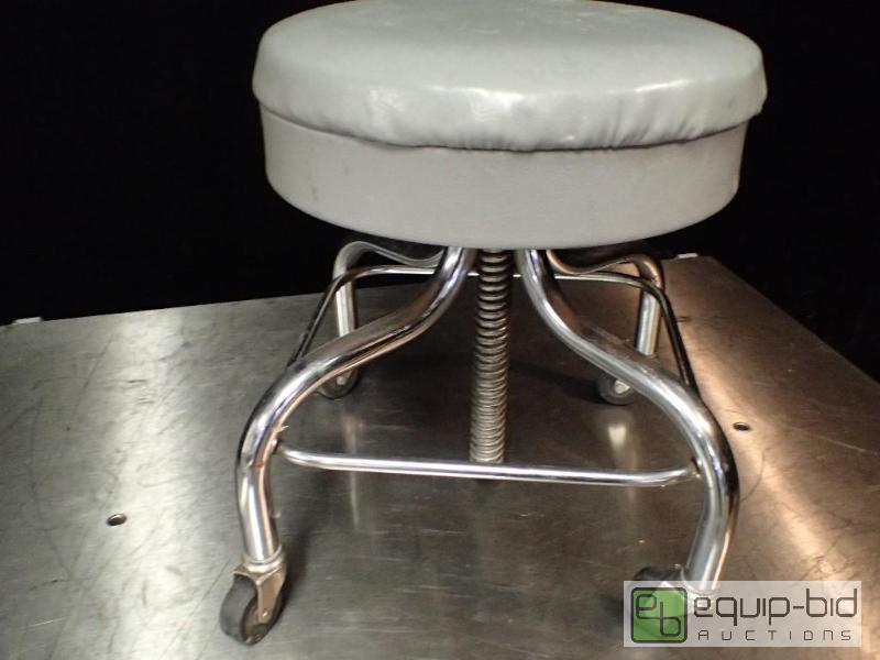 lot 9674 image: Grey Leather Stool on Casters