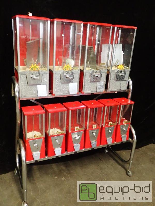 lot 386 image: (10) Northwestern and OAK Candy and Toy Vending Machines on Casters