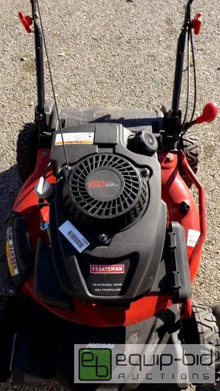 lot 1163 image: Craftsman 21 in. Rear Drive Self-Propelled Lawn Mower Matches You Stride for Stride
