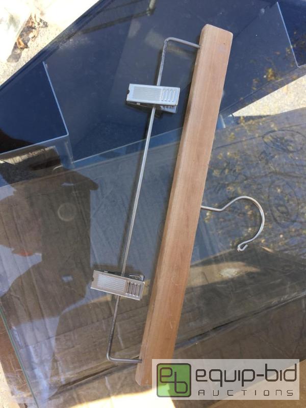 lot 55571 image: Three dozen wooden pant hangers jazz up your ...