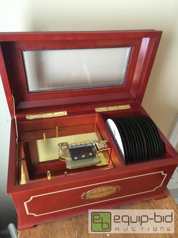 lot 58 image: Very nice music box with 16 music disks great...