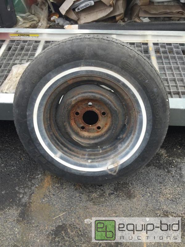 lot 7 image: Size 13 tire and rim in good shape...