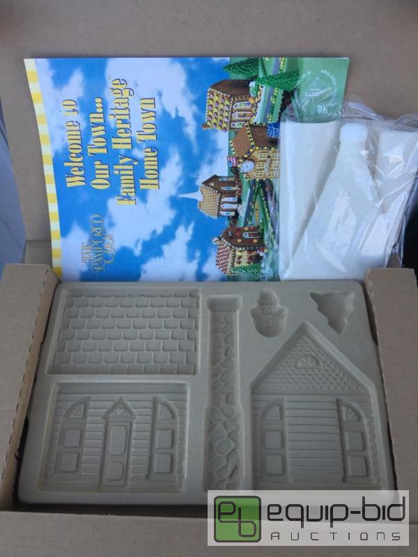 lot 76 image: Pampered chef gingerbread house making kit ne...