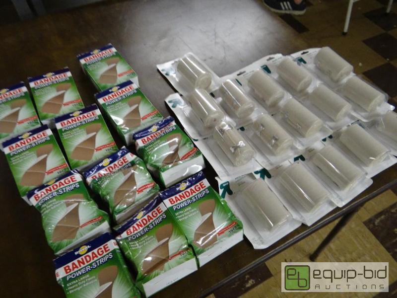 lot 140 image: 12 boxes of bandage power strips and 16 packa...