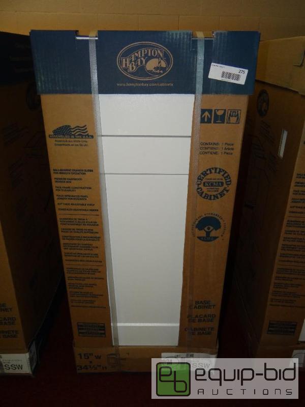 lot 275 image: Hampton Bay cabinet. New in box.  Size is in ...
