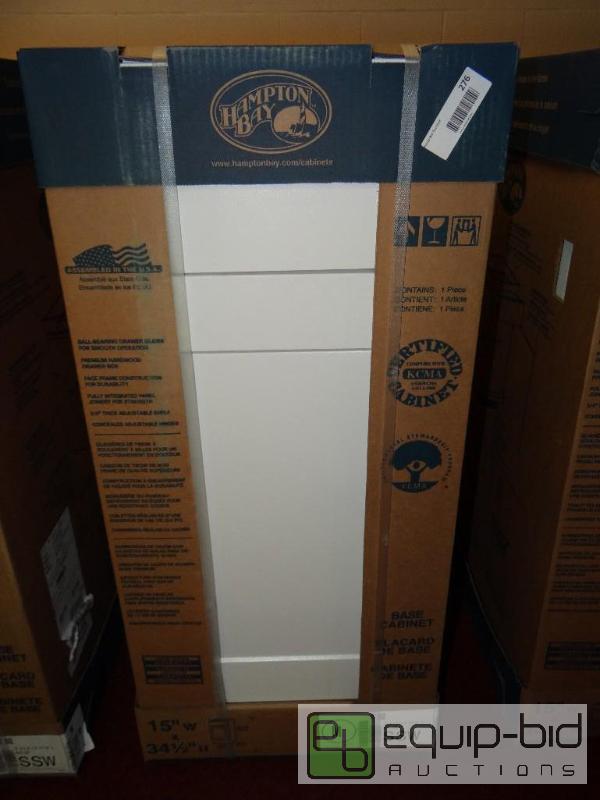 lot 276 image: Hampton Bay cabinet. New in box.  Size is in ...