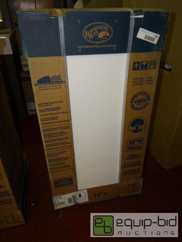 lot 283 image: Hampton Bay cabinet. New in box.  Size is in ...