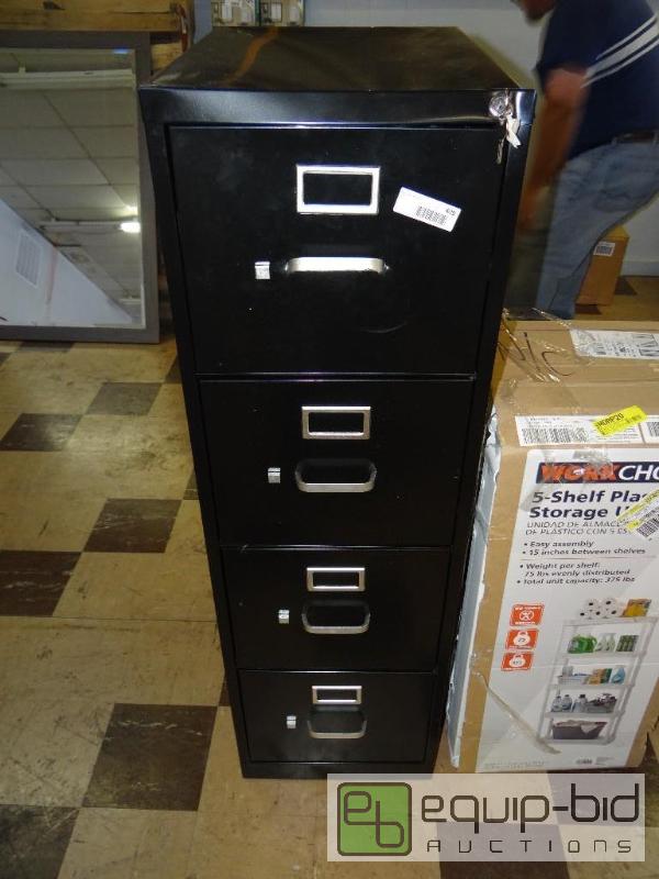 lot 409 image: New 4 dr file cabinet with dented top and pla...