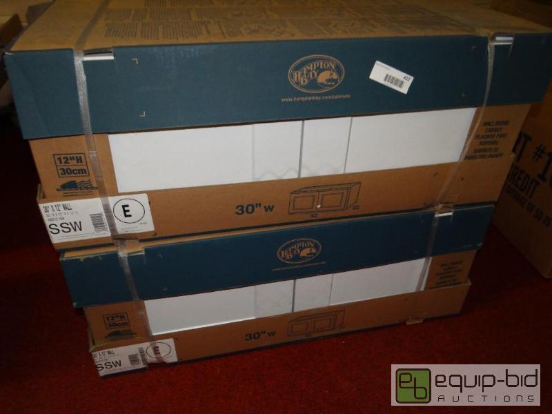 lot 422 image: 2 new Hampton Bay 30&quot wall cabinets....