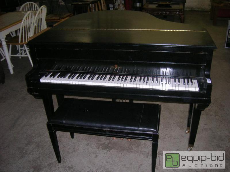 lot 656 image: Wurlitzer Black Baby Grand Piano
